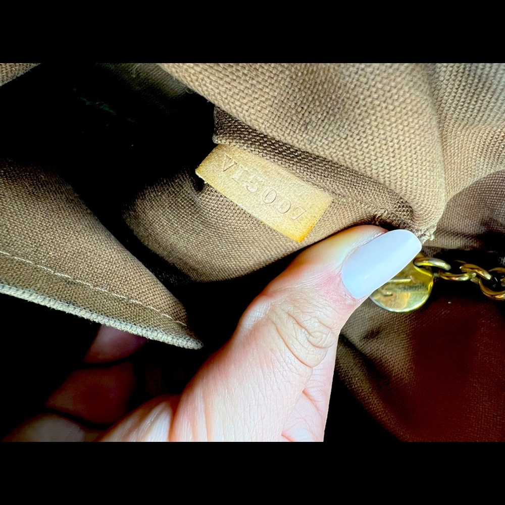 Authentic Louis Vuitton monogram Tívoli PM hand bag